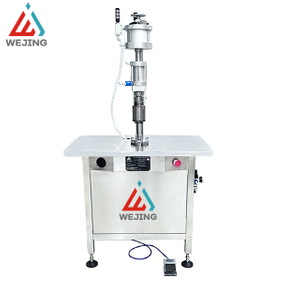 Machine de sertissage de pulvérisation de bombe aérosol semi-automatique, pour le remplissage et le scellage de produits aérosols